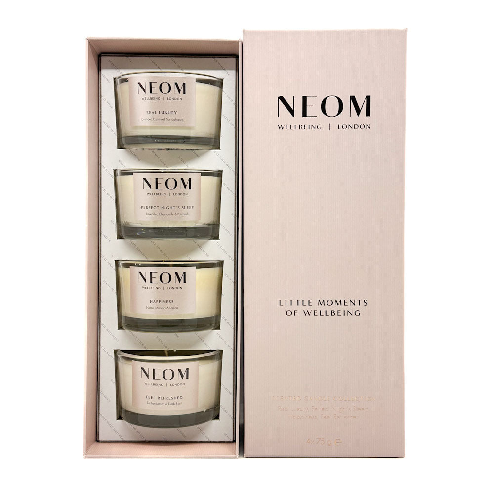 NEOM 'Little Moments of Wellbeing' gift set containing four scented candles in a light pink presentation box with a matching outer box cover.