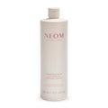 NEOM Complete Bliss Cocooning Shower Cream bottle on a white background