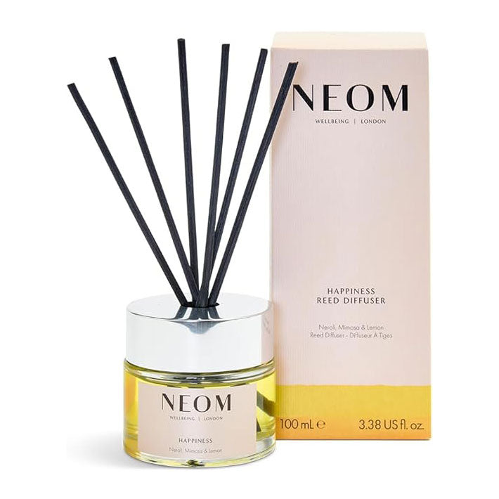Neom Happiness Reed Diffuser with packaging on a white background