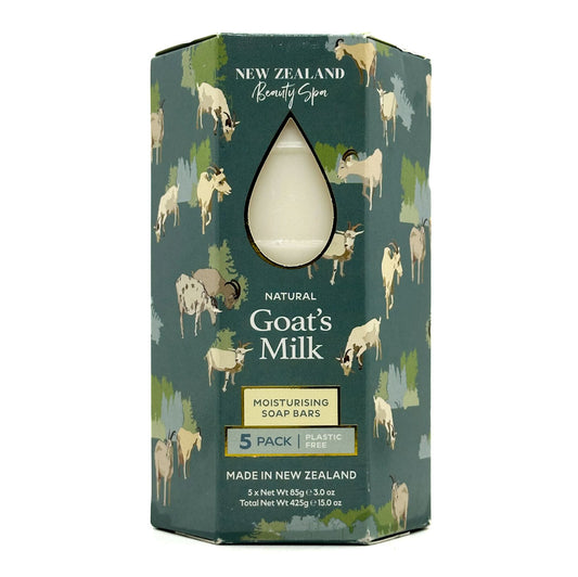 Packaging of New Zealand Beauty Spa's goats' milk soap bars with cow illustrations on a green background.