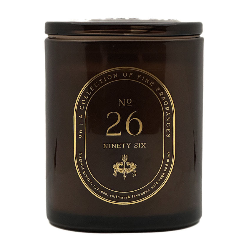 A dark brown glass jar candle with a matching lid, featuring a gold circular label that reads 'No. 26 Ninety Six' and 'A Collection of Fine Fragrances'.