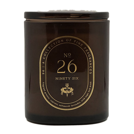 A dark brown glass jar candle with a matching lid, featuring a gold circular label that reads 'No. 26 Ninety Six' and 'A Collection of Fine Fragrances'.