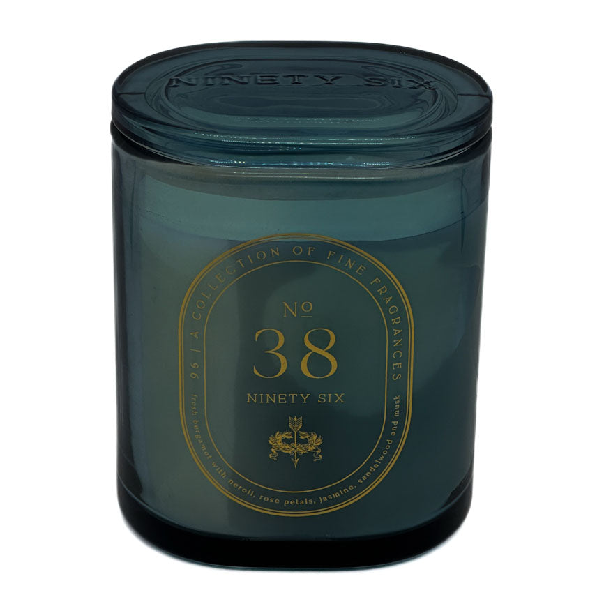 DW Home Ninety Six No. 38 Dark green candle jar with gold text and logo on a white background