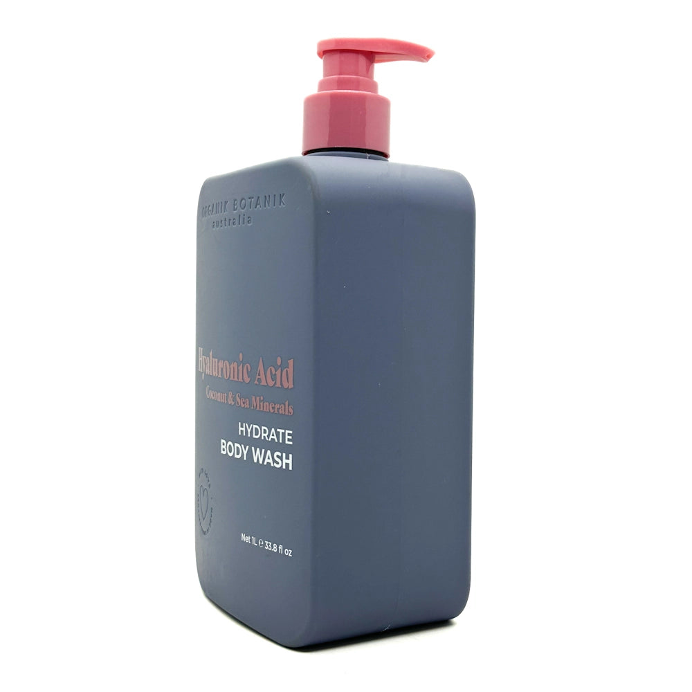 Blue body wash bottle with pink pump on a white background