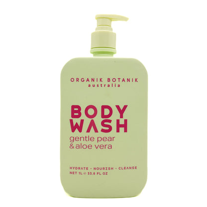A bottle of Organik Botanik Body Wash in the Gentle Pear & Aloe Vera scent. The bottle is a pale, light green colour with a matching pump dispenser, featuring bold magenta text on the front label.