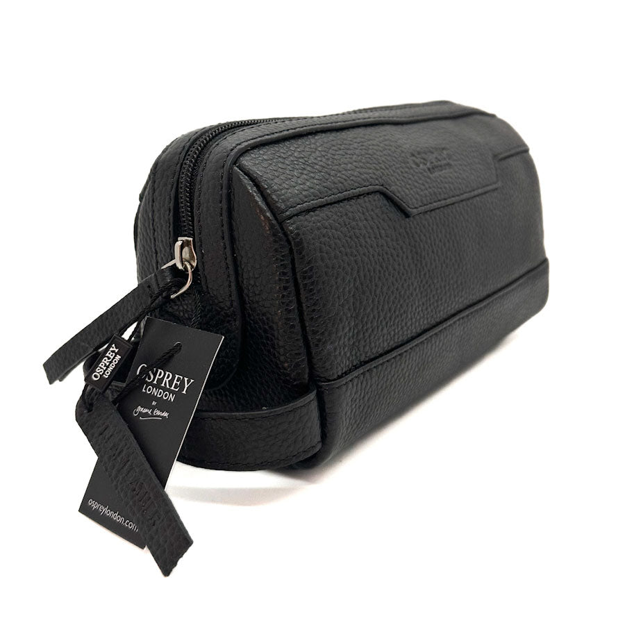 Black leather wash bag with a visible brand tag on a white background