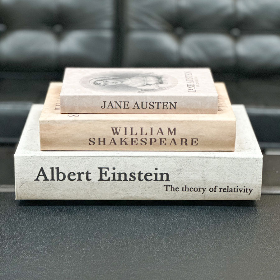 Stack of keepsakes with titles on a table
