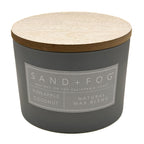 Pineapple Coconut Grey candle with wooden lid and 'Sand + Fog' label on a white background