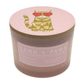 Pineapple Coconut candle in a pink jar with a cat on the lid, branded SAND + PAWS.