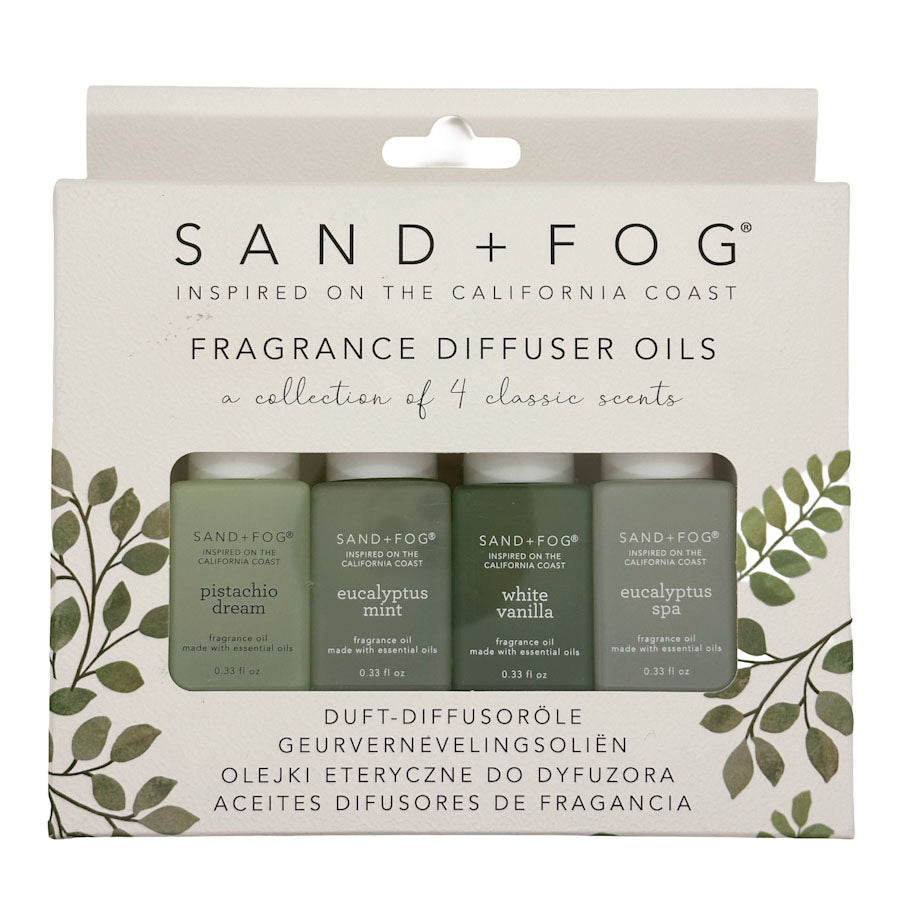 Sand + Fog fragrance diffuser oils with four bottles inside.