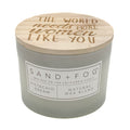 Pistachio Dream candle with wooden lid and 'Sand + Fog' branding on a white background