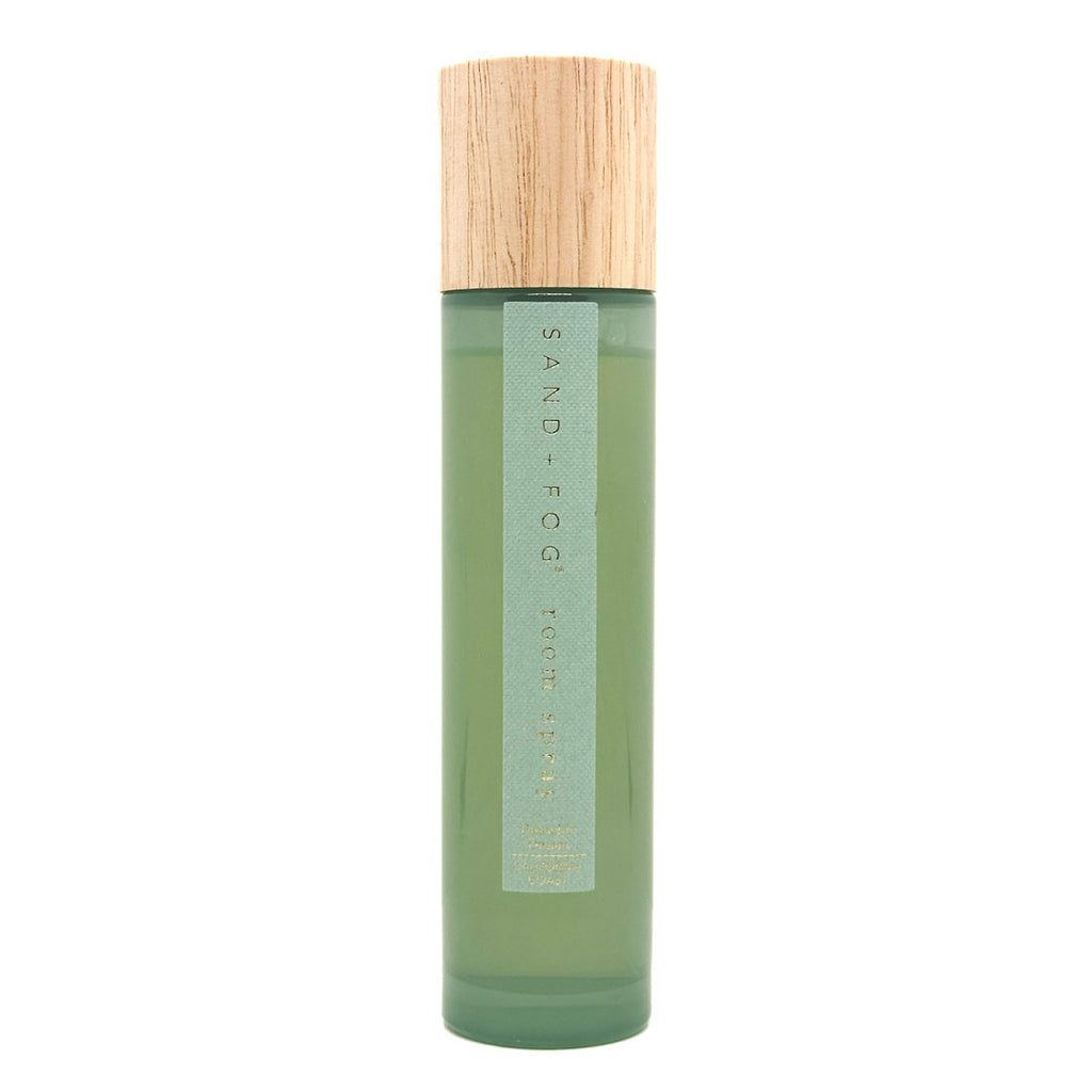 SAND + FOG Pistachio Dream room spray green bottle with wooden cap on a white background