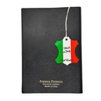 Black leather product with 'Made in Italy' tag on a white background
