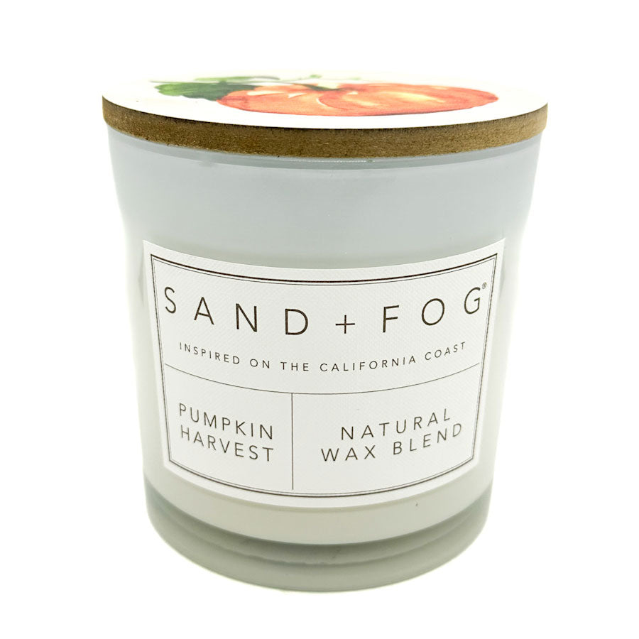 Pumpkin Harvest candle with 'Sand + Fog' label on a white background