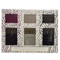 Set of 3 Sand + Fog diffusers in packaging with a decorative pattern