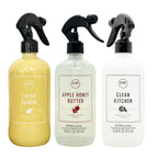DW Home Room & Linen spray bottles with different scents on a white background