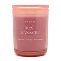 Pink candle labeled 'Rose Ganache' by DW Home on a white background