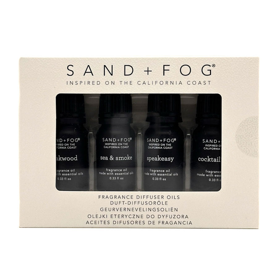 Set of Sand + Fog fragrance diffuser oils in packaging on a white background
