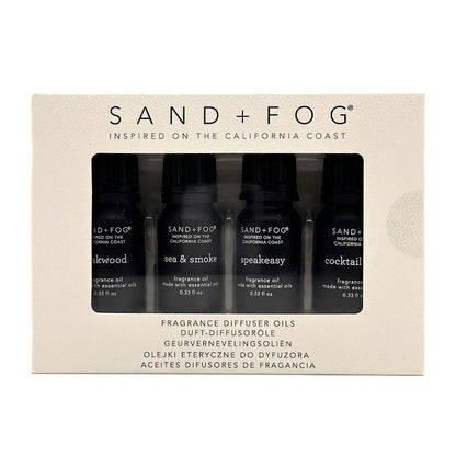 Set of Sand + Fog fragrance diffuser oils in packaging on a white background