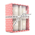 SAND + PAWS Gift Box of four candles in a decorative box with paw prints and 'I wuff you' text.