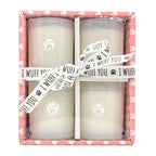 SAND + PAWS Gift Box of four candles in a decorative box with paw prints and 'I wuff you' text.