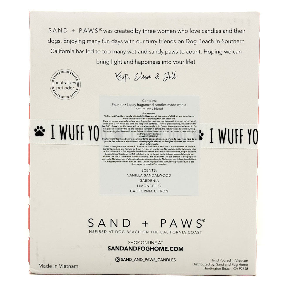 Back of a Sand + Paws candle packaging box with product details and branding.