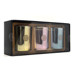 Set of three scented candles in a black box with 'SAND FOG' branding.