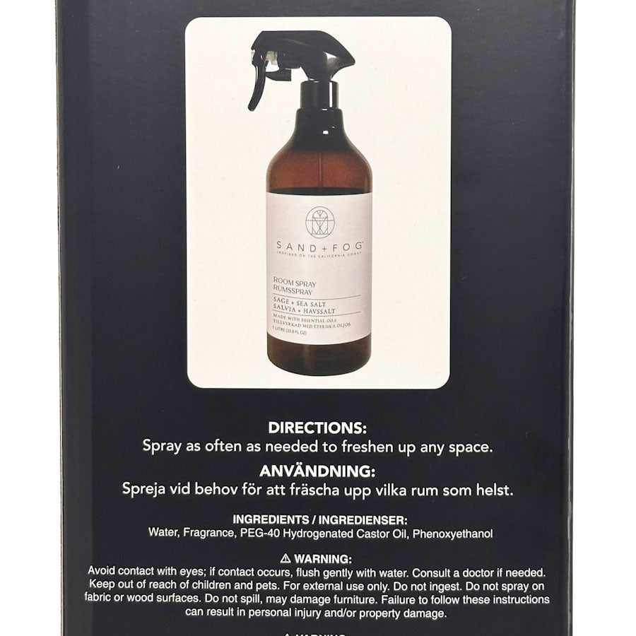 SAND + FOG Sage & Sea Salt room spray bottle with label and directions on a black background