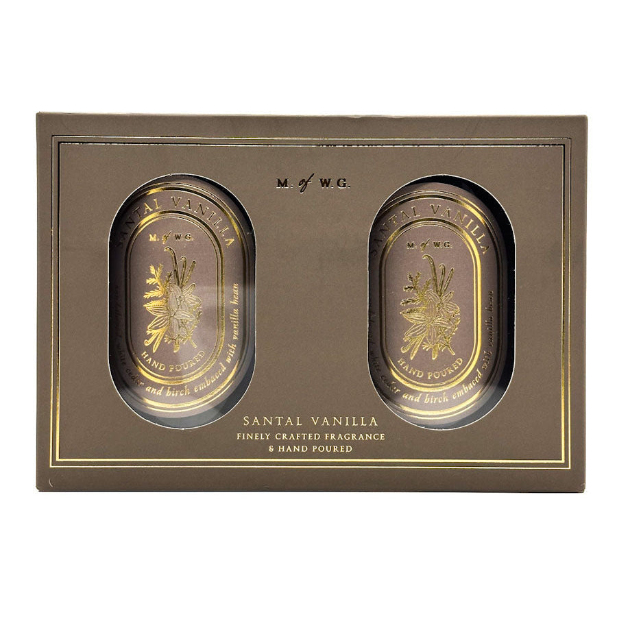 Two MWG candles in a decorative box labeled 'Santal Vanilla' on a white background.