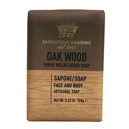 Saponificio Varesino Bar of wood scrub soap with brown top and wooden bottom on a white background