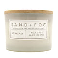 Speakeasy candle with 'Sand + Fog' label on a white background