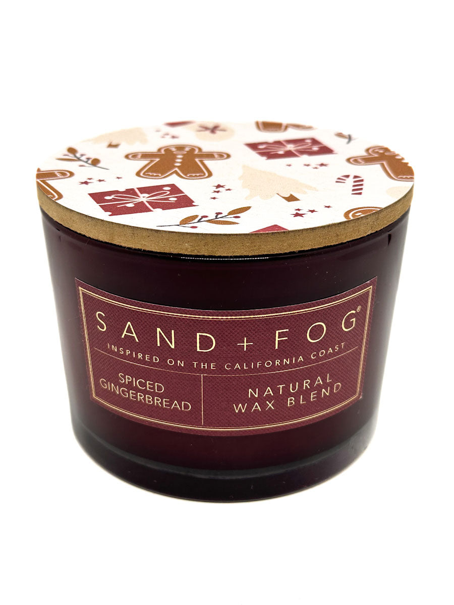 Sand + Fog spiced gingerbread candle with decorative lid on a white background