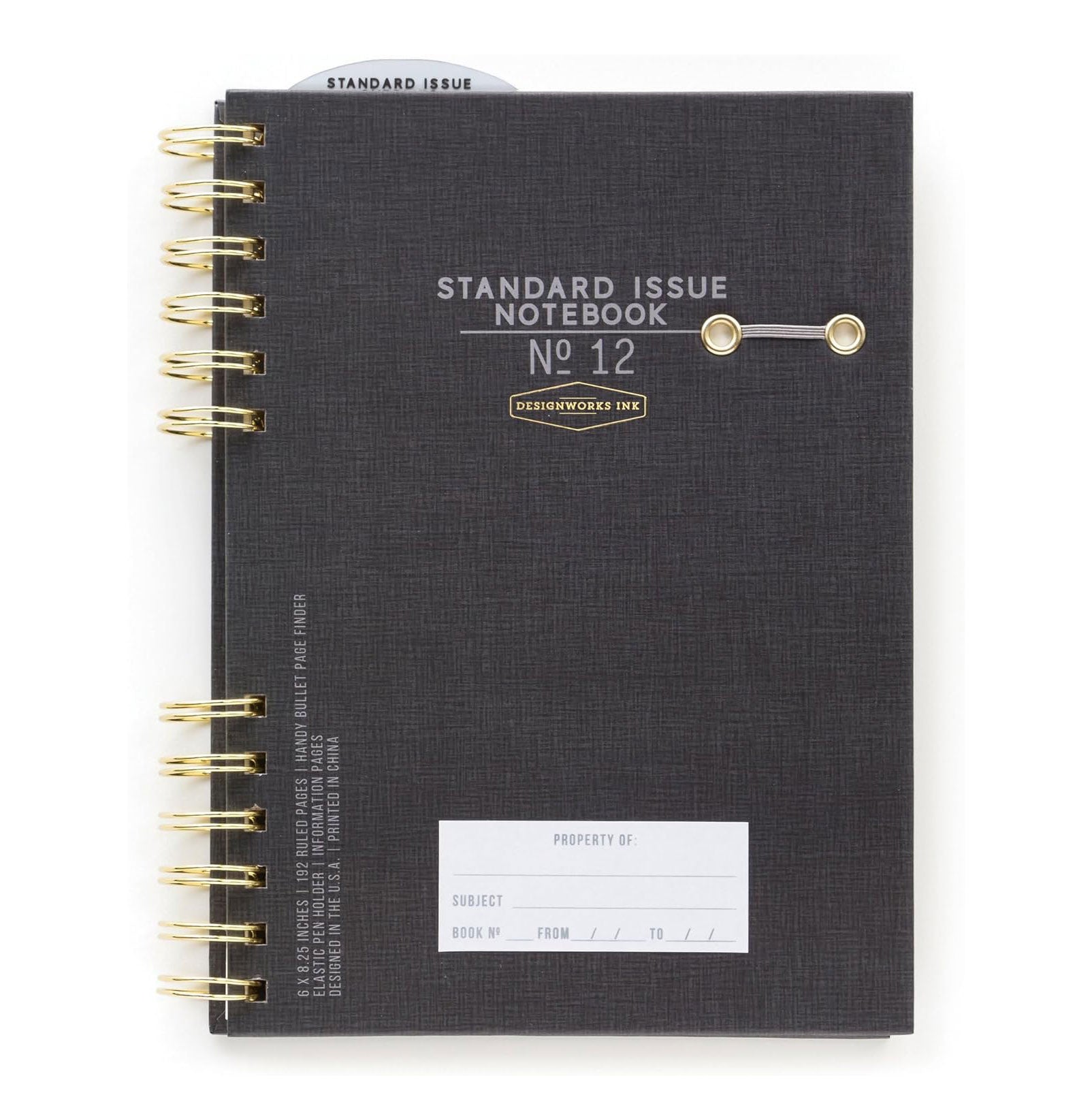 Standard Issue No12 black notebook with gold spiral binding on a white background