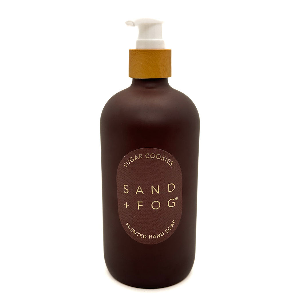 Brown bottle of Sand & Fog Sugar  Cookies scented hand soap on a white background