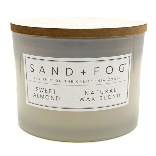 Sweet Almond Candle with 'Sand + Fog' label on a white background