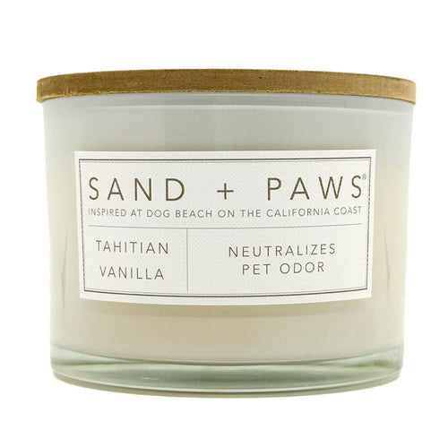 Tahitian Vanilla Candle with 'Sand + Paws' label on a white background