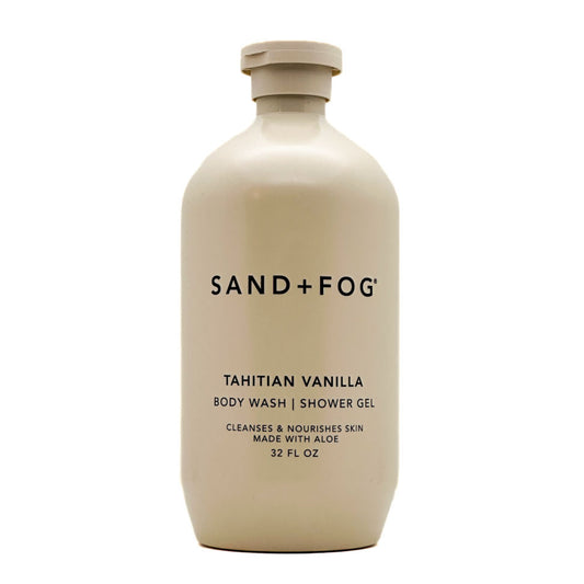 Beige bottle of Sand + Fog Tahitian Vanilla body wash on a white background