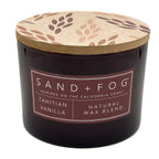 Tahitian Vanilla Sand + Fog candle with a decorative lid on a white background