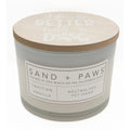 Tahitian Vanilla candle with a wooden lid labeled 'Sand + Paws' on a white background