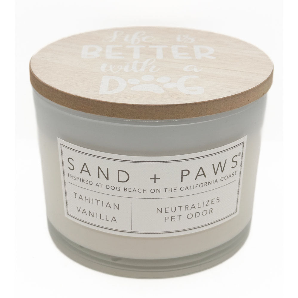 Tahitian Vanilla candle with a wooden lid labeled 'Sand + Paws' on a white background