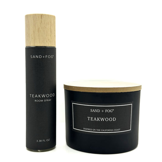 Black room spray and candle set with 'Sand + Fog' branding on a white background