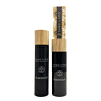 Teakwood room spray + reed diffuser with wooden caps and 'Sand + Fog' branding on a white background.