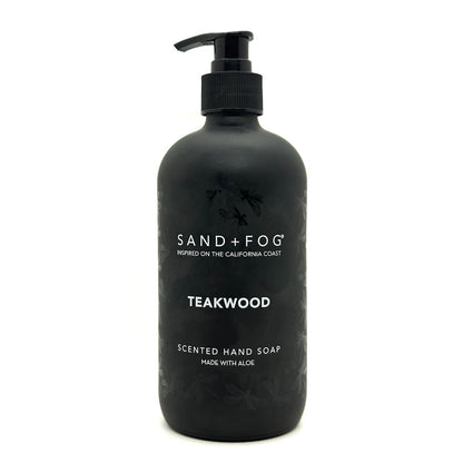 Black bottle of Sand + Fog Teakwood scented hand soap on a white background