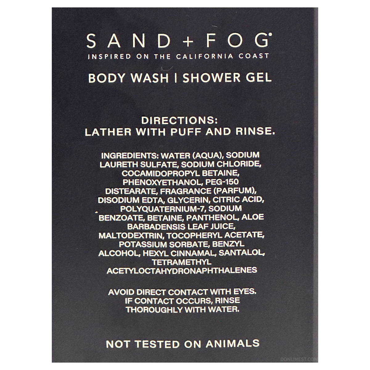 A black rectangular product card for Sand + Fog Body Wash and Shower Gel, featuring white text with directions, ingredients, and animal testing status.