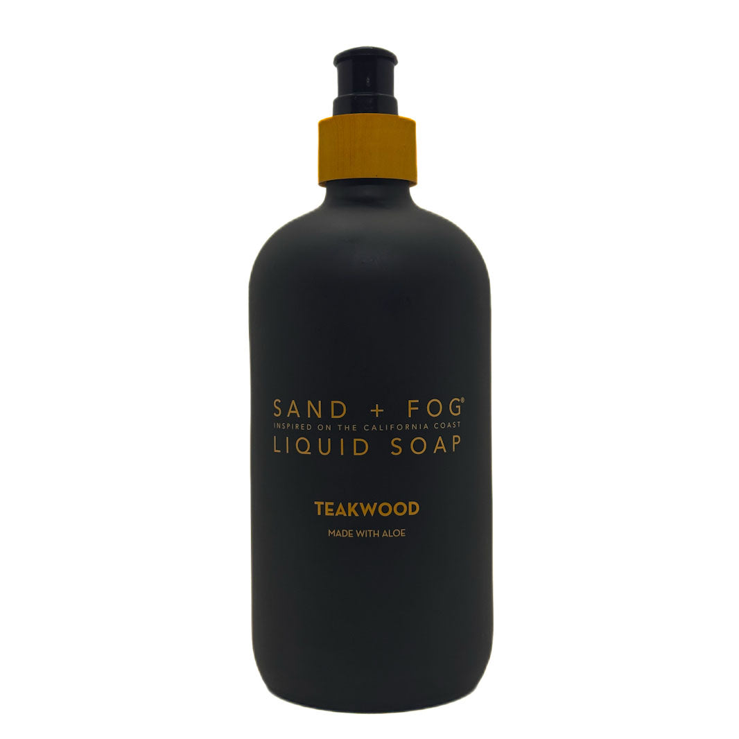 SAND + FOG Teakwood black liquid soap bottle with gold text on a white background