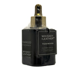 Black bottle of Whiskey & Leather Teakwood Eau de Parfum Oil on a white background