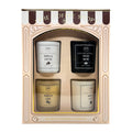 Set of four DW Home scented candles in a decorative box labeled 'The Coffee Shop'.