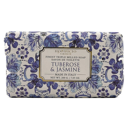 A rectangular bar of HOpificio Firenze tuberosse & jasmine toilet soap, featuring a blue and purple floral pattern on a white background with a central cream-colored label.