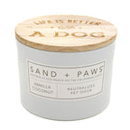 Vanilla Coconut candle with wooden lid labeled 'Life is Better with a Dog' by Sand + Paws on a white background