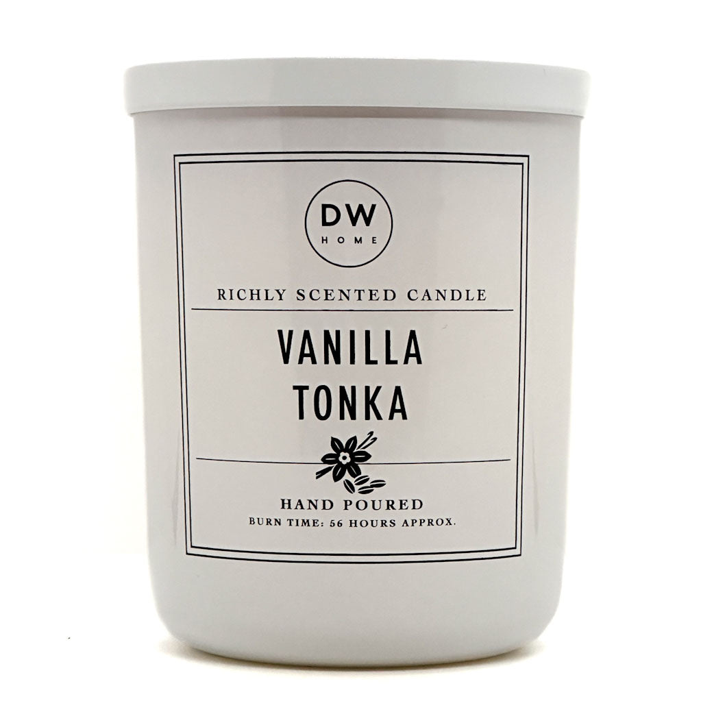 A white glass jar candle with a white lid and a clean white label that reads 'DW HOME' and 'VANILLA TONKA' on a plain white background.